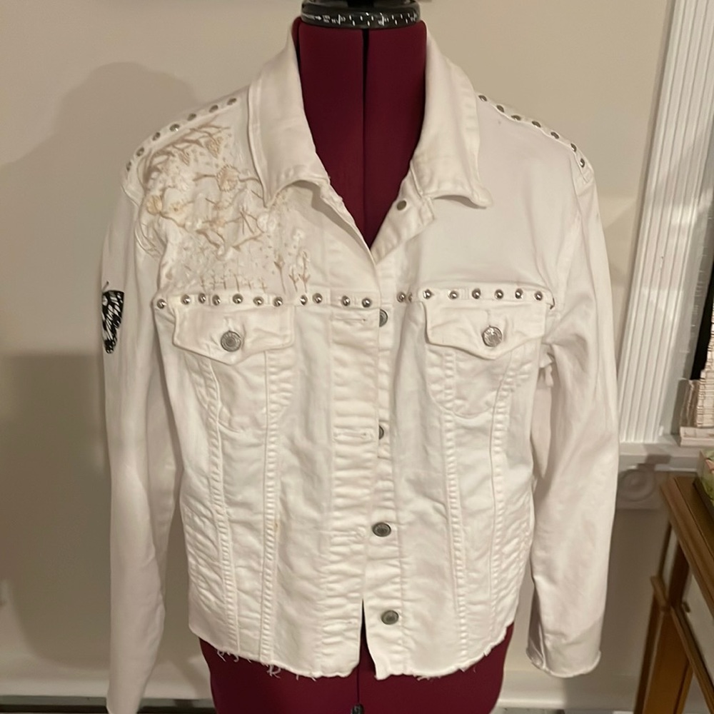 White jean jacket hand painted and embroidered.